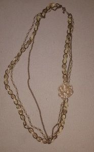 Gold with white ribbon necklace. Long.